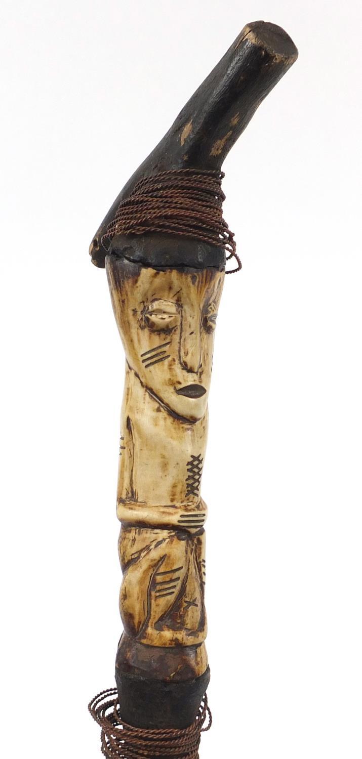 African cane with carved bone figural handle and a steel bladed sword with leather sheaf, the - Image 5 of 6