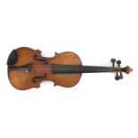Old wooden violin bearing a Stradivarius label, impressed Stradunt to the scrolled neck, the