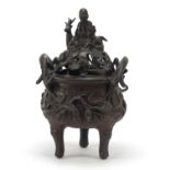 Chinese patinated bronze tripod censer with figural cover, 27cm high : For Further Condition Reports