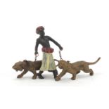 Cold painted bronze of an Arab with two tigers in the style of Franz Xaver Bergmann, 13cm high : For