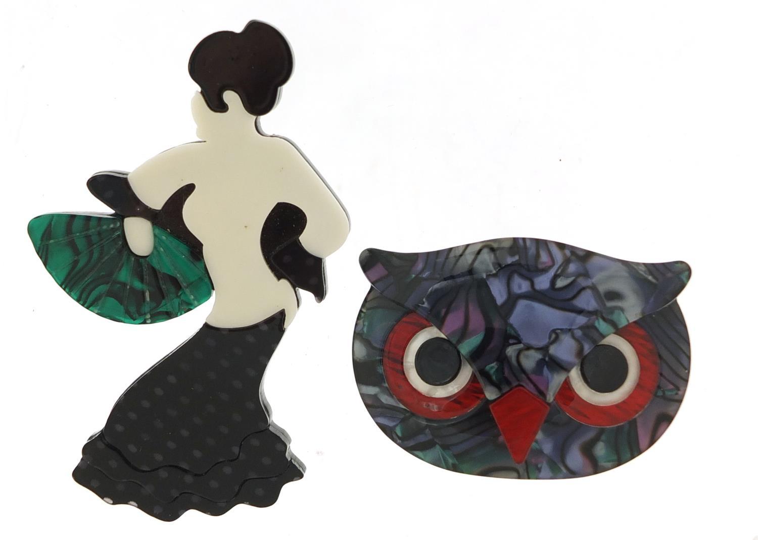 Two Art Deco design brooches in the form of a flamenco dancer and an owls head, the largest 9cm high