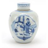Chinese blue and white porcelain jar and cover, hand painted with panels of figures in a garden