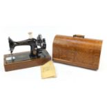 Victorian Singer sewing machine with case, 45cm wide : For Further Condition Reports Please Visit