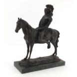 Large patinated bronze of a South American on horseback, raised on a green marbleised base, 40.5cm