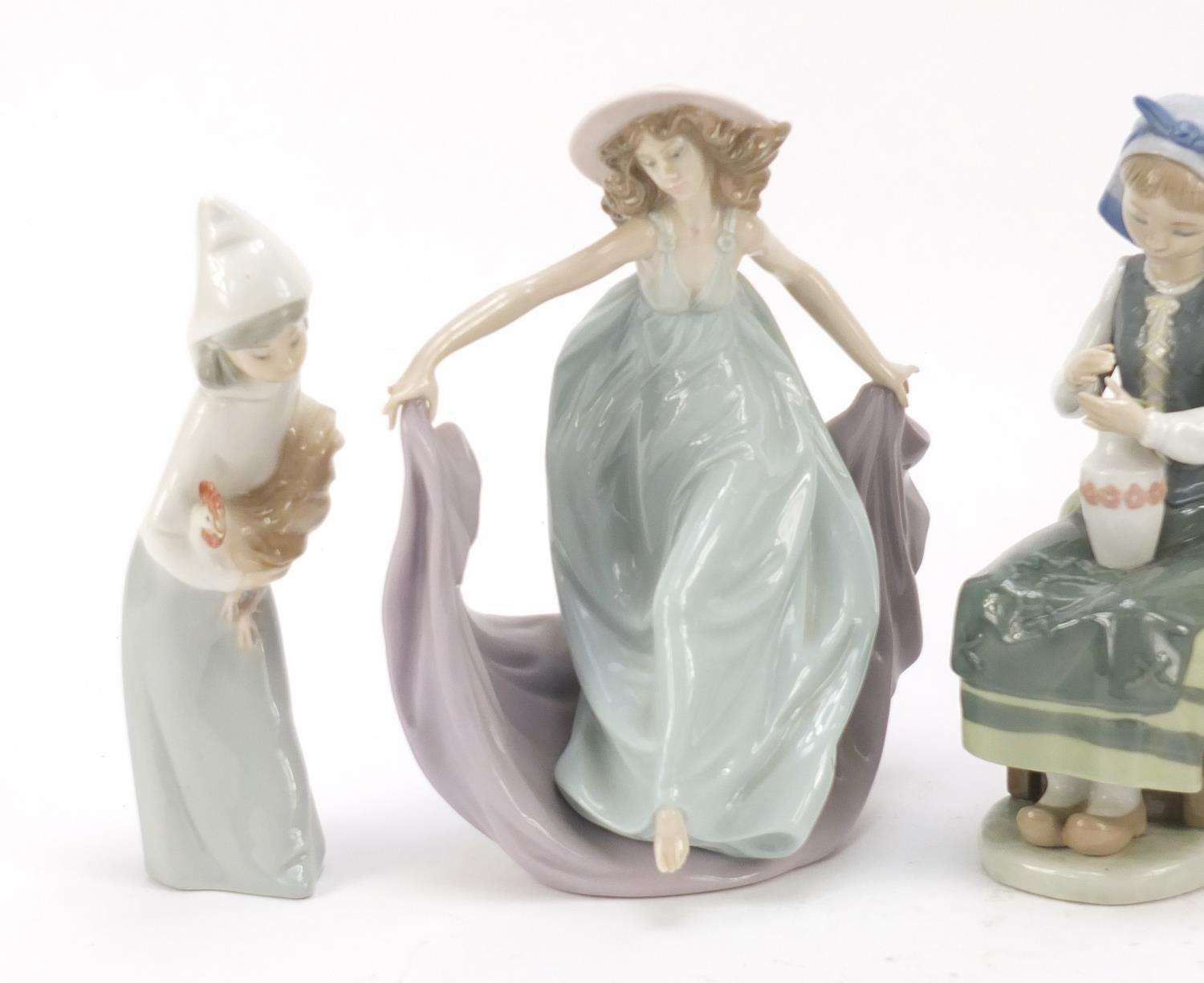 Four Lladro and Nao figure groups, the largest 23cm high : For Further Condition Reports Please - Image 2 of 10