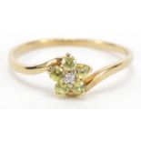 9ct gold peridot and diamond flower head ring, size V, 1.4g : For Further Condition Reports Please