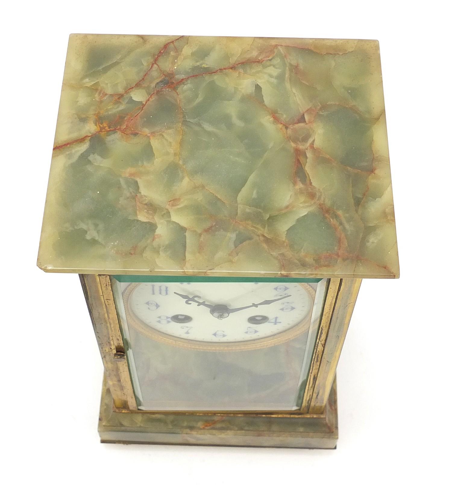 19th century French onyx and brass four glass mantle clock striking on a gong, the enamelled dial - Image 8 of 8