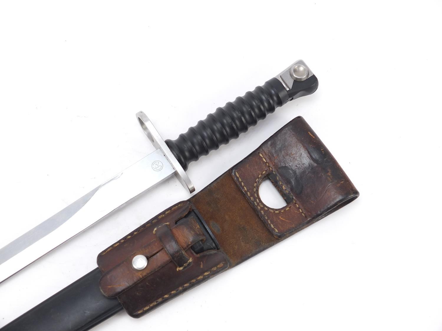 German military interest bayonet with scabbard and leather frog, 38cm in length : For Further