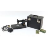 Vintage black enamel electric Singer sewing machine with case, model 221K : For Further Condition