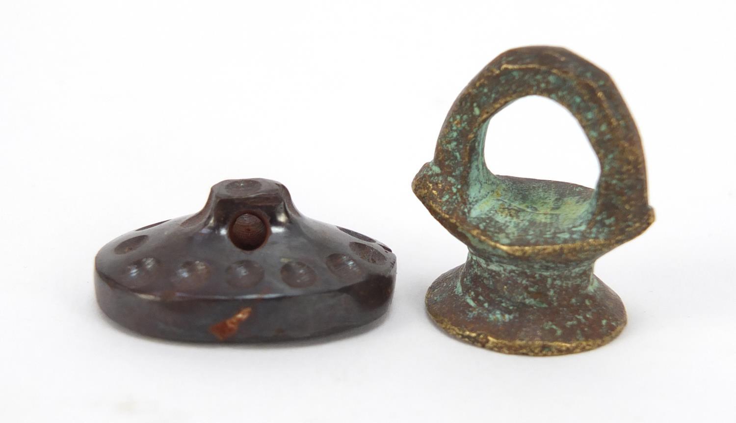 Two intaglio seals including a bronze example, the largest 2.5cm high : For Further Condition