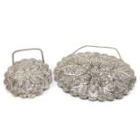 Two Indian 900 silver mirrors embossed with flowers, the largest 25.5cm x 18cm : For Further