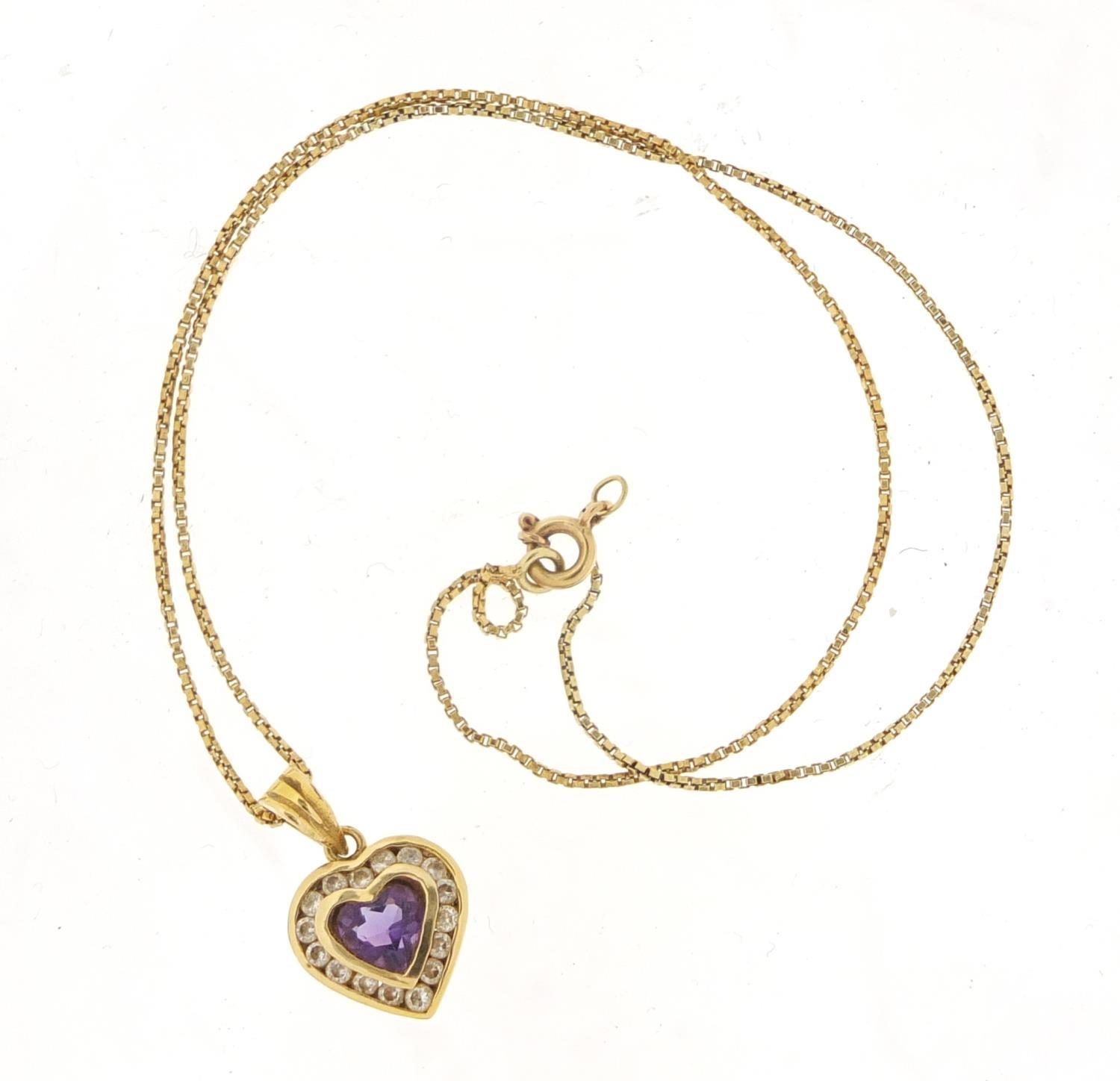 14ct gold amethyst and clear stone love heart pendant, 2cm in length on an unmarked gold coloured - Image 3 of 5