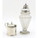 Cut glass sifter with silver lid and a silver mustard with blue glass liner, the largest 16.5cm high