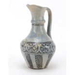 Islamic terracotta vase hand painted with flowers and a jug, the largest 39cm high : For Further
