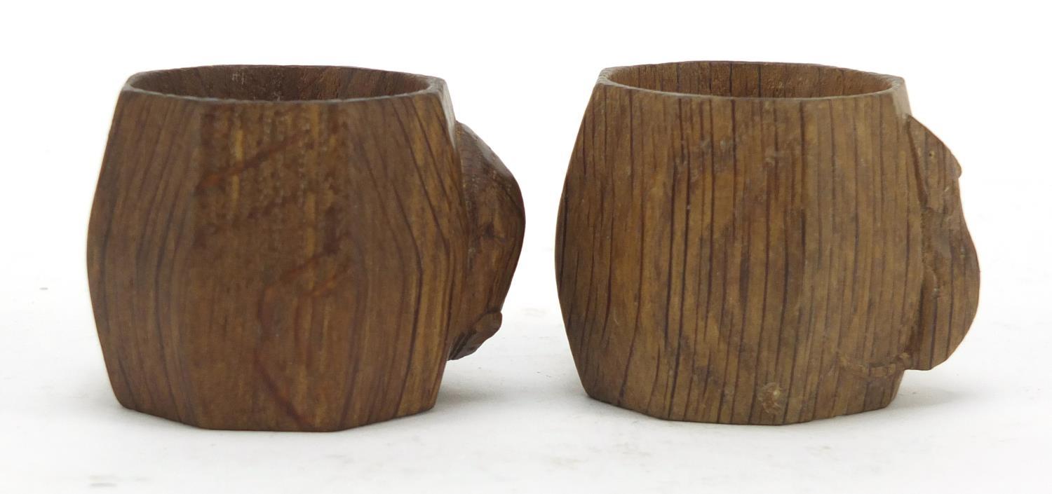 Robert Mouseman Thompson pair of octagonal adzed oak napkin rings, each carved with a signature - Image 4 of 6