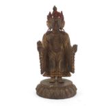 Chino-Tibetan gilt bronze figure of standing Buddha with remnants of paint, 34cm high : For