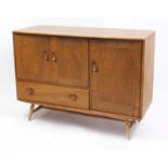 Ercol Windsor light elm sideboard with three cupboard doors and a drawer, 82cm H x 114cm W x 48cm