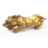 Chino-Tibetan gilt bronze mythical dragon, 25cm in length : For Further Condition Reports Please