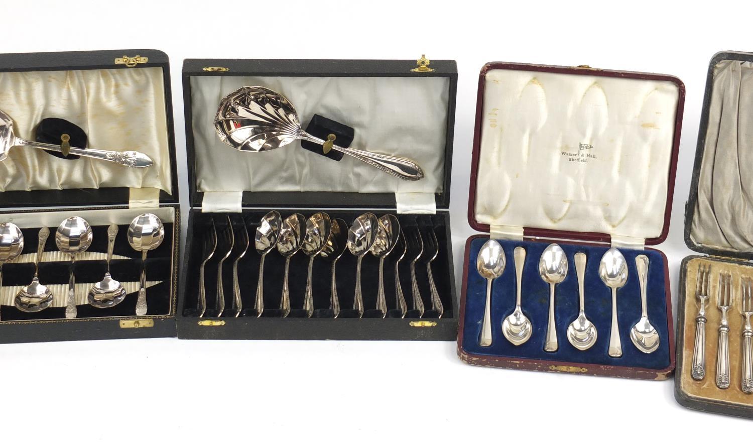 Five cutlery sets housed in fitted boxes, the largest 27.5cm wide : For Further Condition Reports - Image 3 of 15