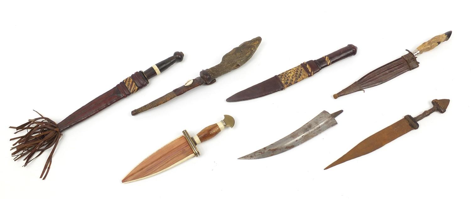 Seven daggers including a taxidermy interest example with lizard head handle, the largest 35cm in - Image 9 of 9