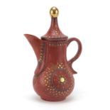 Turkish Tophane terracotta water jug incised and painted with flower heads, 27cm high : For
