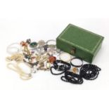 Victorian and later costume jewellery arranged in a box, some silver, including a Japanese carved
