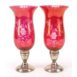 Duchin Creation, pair of sterling silver candleholders with etched cranberry glass shades, each 27.