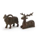 Two Japanese patinated bronze models of animals, one with impressed marks to the base, the largest