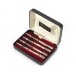 Set of four silver bridge pencils with suit motifs and case, Birmingham 1947, each 9cm in length :
