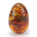 Large natural polished amber egg, 6.5cm high, 102.5g : For Further Condition Reports Please Visit