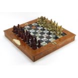 Chinese carved wood folding chess board with pieces, the largest piece 8cm high, the board 46cm x