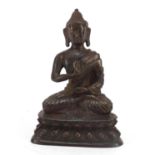 Chino-Tibetan patinated bronze figure of Buddha, 16cm high : For Further Condition Reports Please