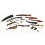 Tribal daggers and weapons and a Japanese Trousse eating set, the largest 40cm in length : For