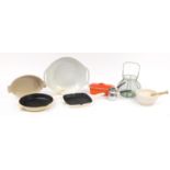Kitchenalia comprising a parian pestle and mortar, Le Creuset paella dish, baking dish and griddle