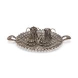 Unmarked filigree silver coloured metal dolls house tea service on tray, the tray 11cm in length,