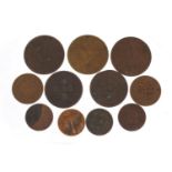 Eleven Chinese bronze coins, the largest 4.2cm in diameter : For Further Condition Reports Please