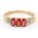 9ct gold red stone and diamond ring, size O, 2.4g : For Further Condition Reports Please Visit Our