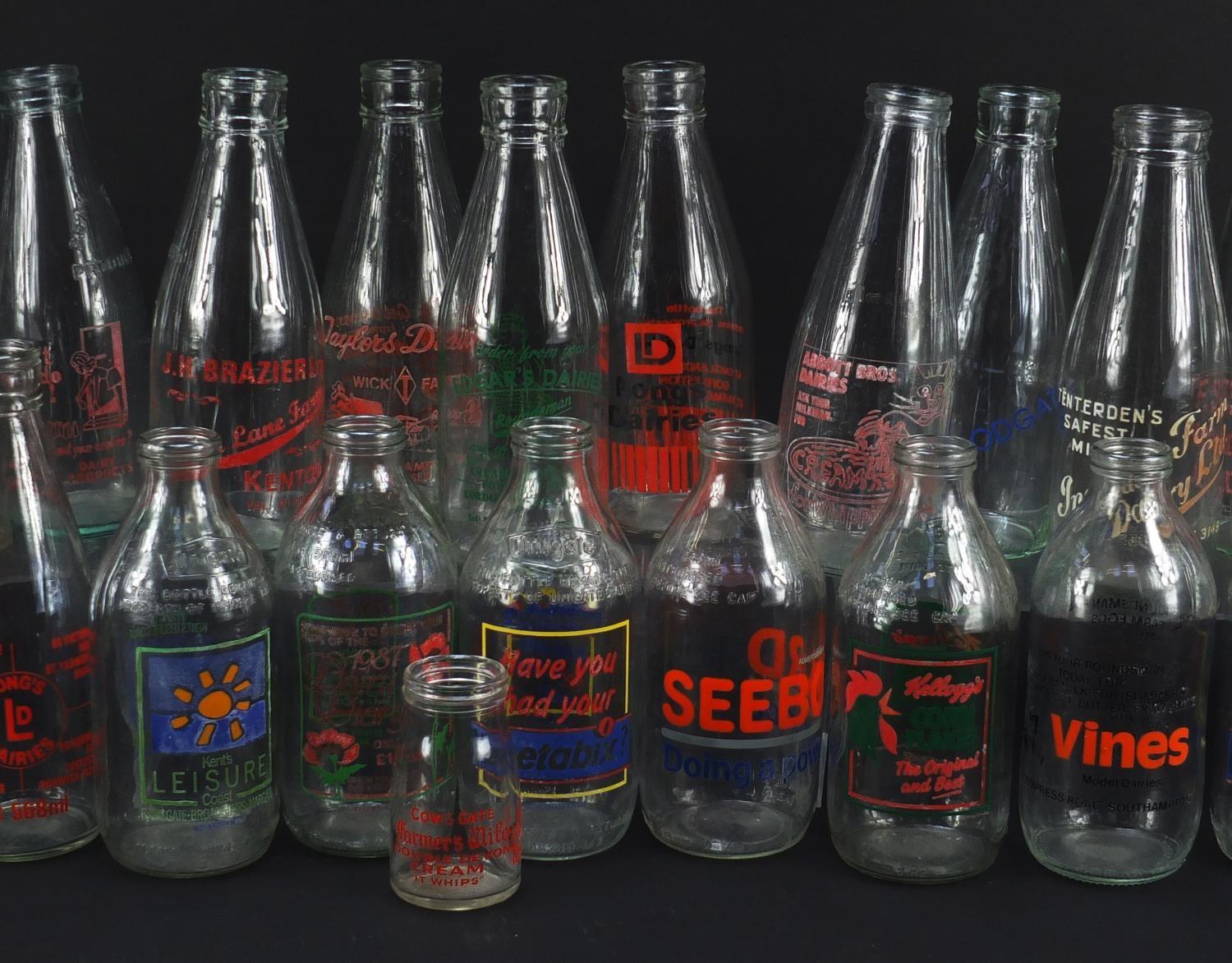 Collection of advertising milk bottles, each 18cm high : For Further Condition Reports Please - Image 4 of 6