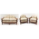 Victorian walnut framed double bergere three piece suite, each with carved scrolling arms on claw