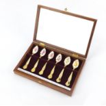 Cased set of six gold plated teaspoons decorated with flowers, each 12.5cm long : For Further