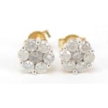 Pair of 9ct gold diamond flower head earrings, approximately 1 carat in total, 1.5g : For Further