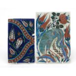 Pair of Islamic Iznik pottery tiles including one hand painted with a peacock, 24cm x 16.5cm : For