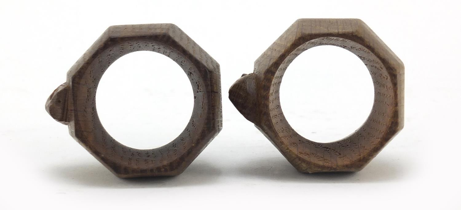 Robert Mouseman Thompson pair of octagonal adzed oak napkin rings, each carved with a signature - Image 6 of 6