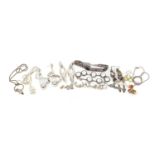 Silver and white metal jewellery including smokey quartz bracelet, necklaces and earrings, some