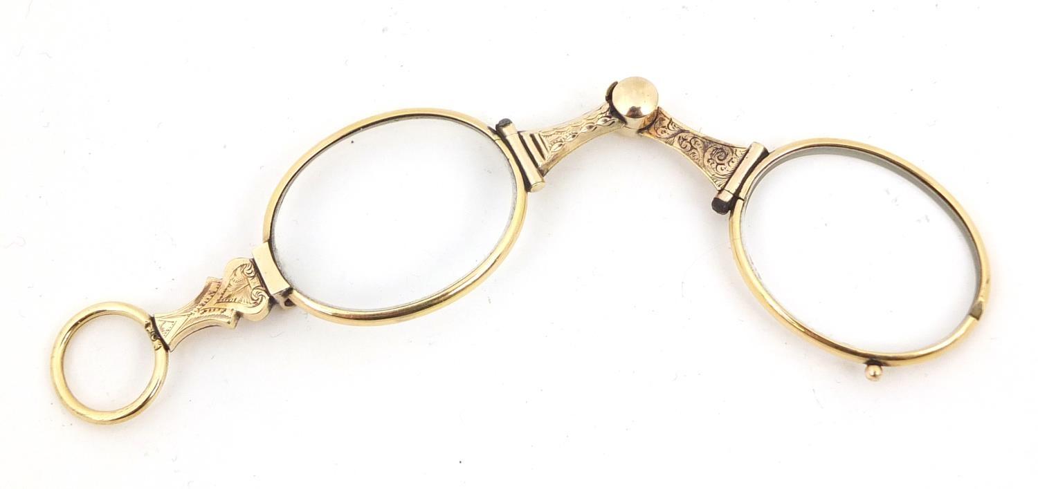 Pair of 19th century gold coloured metal folding spectacles, partially tested for 18ct and 14ct - Image 2 of 4
