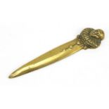 Novelty brass letter opener modelled as a Pirouette, 20cm in length : For Further Condition