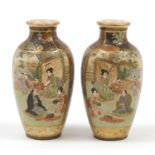 Pair of Japanese Satsuma pottery vases hand painted with figures and flowers, character marks to the