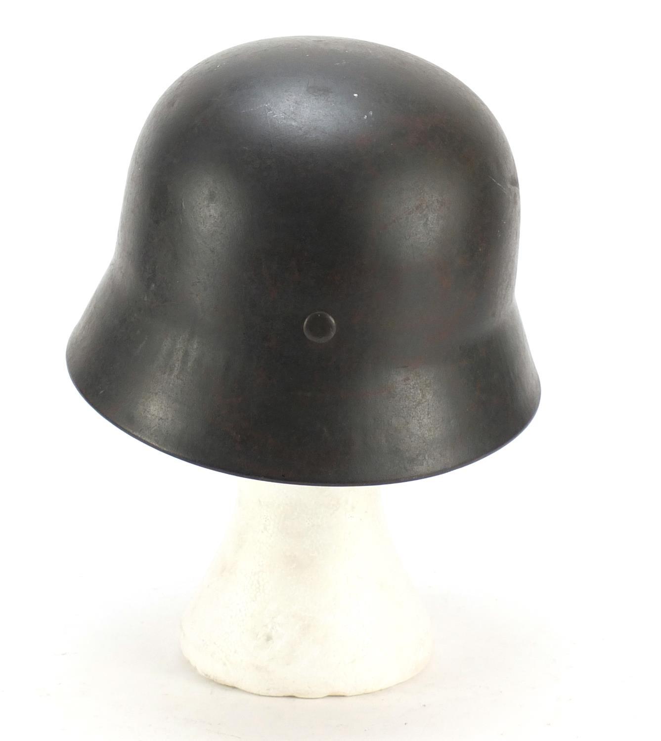 German military interest steel helmet with SS badge and leather liner, impressed 1256 and ET64 : For - Image 3 of 6