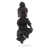 Chinese patinated bronze figure of a girl holding a flower, 26cm high : For Further Condition