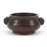Chinese patinated bronze censer with ram's head handles, four figure character marks to the base,